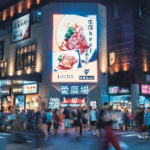 A group of people walking on a street AI-generated content may be incorrect.