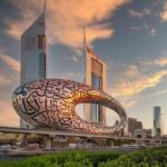 A large sculpture with writing on it Description automatically generated