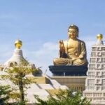 A large statue of a buddha Description automatically generated