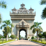 A large stone structure with a large arch Description automatically generated