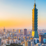 A city with tall buildings and trees AI-generated content may be incorrect.