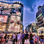 A group of people in a busy city AI-generated content may be incorrect.