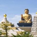 A large statue of a buddha Description automatically generated