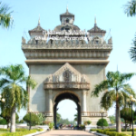 A large stone structure with a large arch Description automatically generated